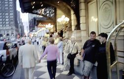 Pedestrians walking to their Hotel in Central Park NYC