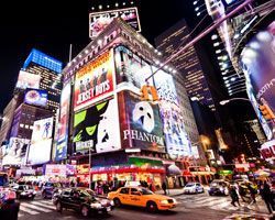 Night time in Times Square with Broadway Theaters